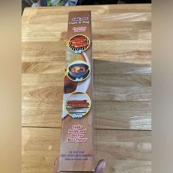 Curl a dog spiral hot dog slicer. I have 2 available - Picture 2 of 3